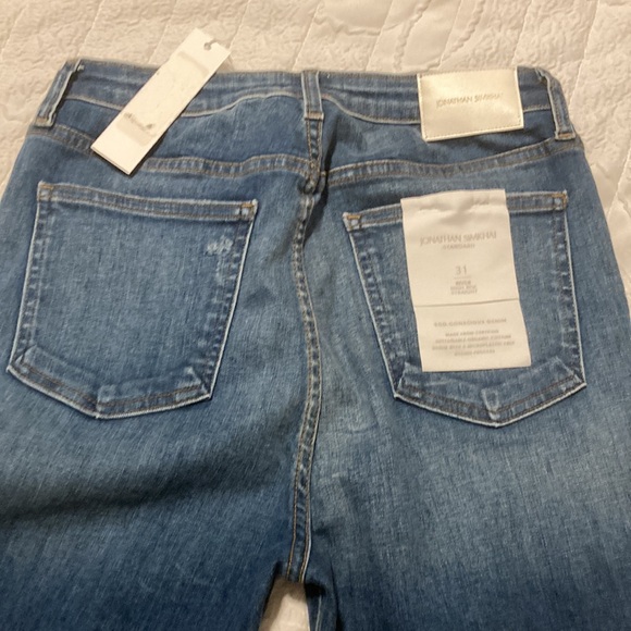 New Jonathan Simkhai distresses high ankle stretch ankle cropped jeans. - Picture 6 of 6